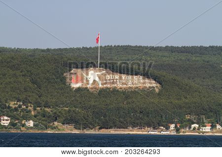 CANAKKALE TURKEY - JULY 02 2017: The Dur Yolcu memorial in Kilitbahir District. English translation of this memorial is Traveller halt! The soil you tread Once witnessed the end of an era.