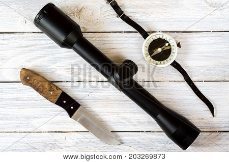 Optical Sight, Hunting Knife And Vintage Compass.
