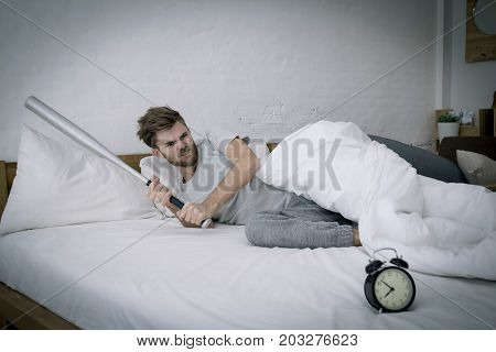 Portrait Upset Angry With Baseball Hit Young Man Screaming At Alarm Clock On Bedroom. Employee Runni