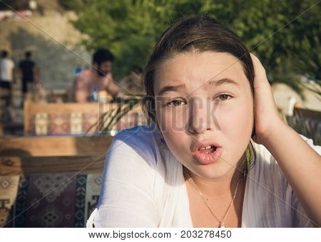 Outraged teenage girl outdoors portrait