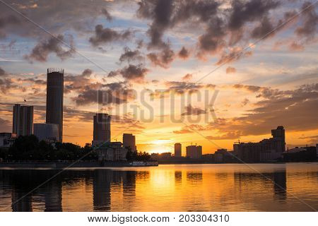 Yekaterinburg City Center On Sunset. City Pond View, Amazing Clouds And Sky. High Buildings, Skyscra