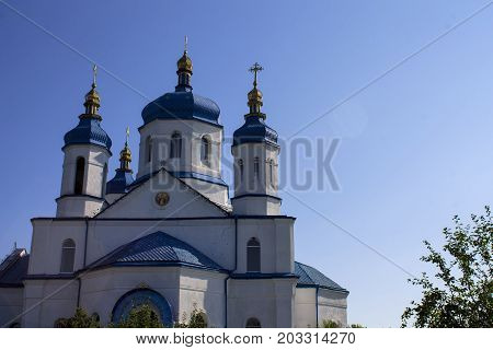 Church religion building cross white architecture sky country rural chapel.