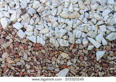 Fine natural stone mulch for landscaping texture background.