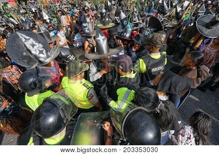June 24 2017 Cotacachi Ecuador: riot police on duty at the Inti Raymi parade at summer solstice