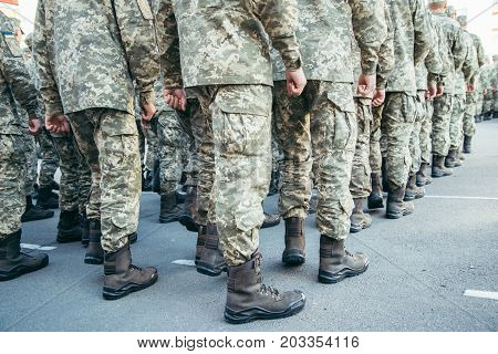 Military boots army walk the parade ground crop photo