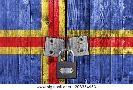 Aland flag on door with padlock close