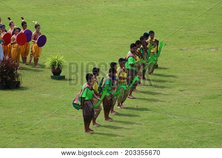 Thai dance performances of students in the stadium Darunothai School Trang Thailand August 19 2016.