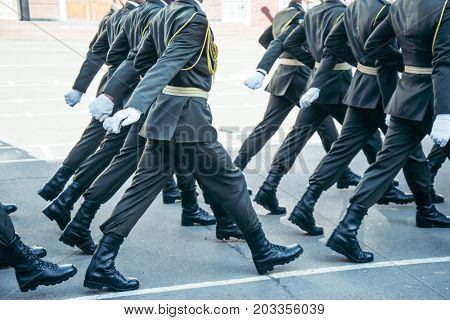 Military boots army walk the parade ground crop photo