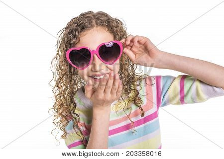 A Portrait of 9 years old girl with curly hair, isolated on white