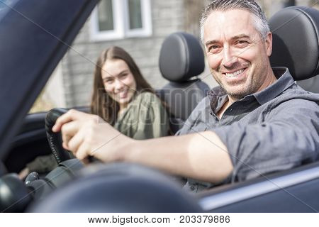 A Father On Car Journey With Teenage daughter