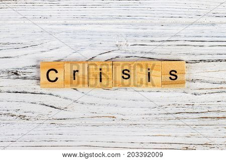 CRISIS word made with building blocks. CRISIS word on block concept