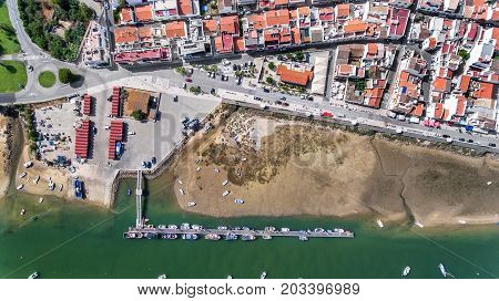 Aerial. Port, pier of fishing ships. Sky view Cabanas Tavira