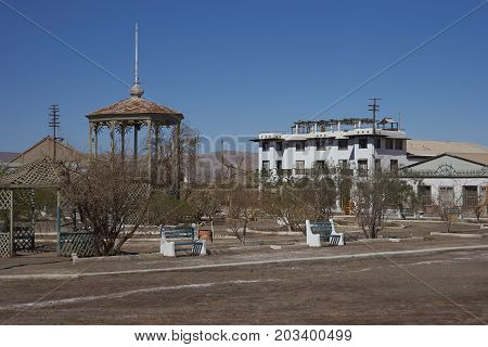 Chacabuco, Antofagasta Region, Chile - August 19, 2017: Town square and theatre in the derelict nitrate mining town of Chacabuco in the Atacama Desert of northern Chile