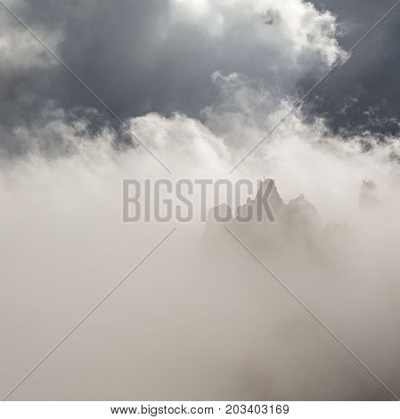 Mountain Peak In The Clouds