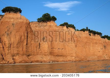 Effects of seaside coastal erosion with clayey soil