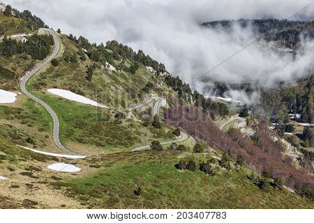 Images of the road to Col de Pailheres (2001 m) located in Pyrenees Mountains