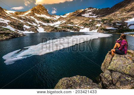 Tourist In Colorado Hiker Girl Rests At Blue Lake