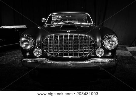 MAASTRICHT NETHERLANDS - JANUARY 08 2015: Italian car Lancia Aurelia B52 Coupe Vignale 1952. Black and white. International Exhibition InterClassics & Topmobiel 2015