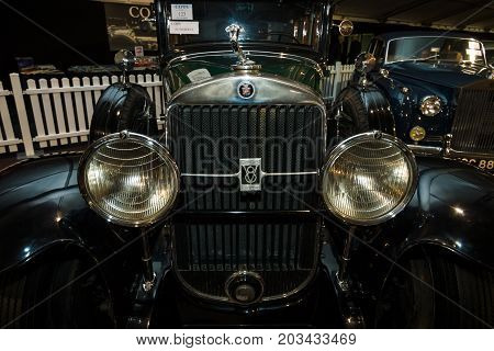 MAASTRICHT NETHERLANDS - JANUARY 08 2015: Radiator grill and headlamps of a oldtimer Cadillac 341-A Fleetwood 1929. International Exhibition InterClassics & Topmobiel 2015