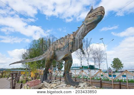KIROV, RUSSIA - AUGUST 30, 2017: A sculpture of a predatory dinosaur - carnotaurus close up. Theme children's park 