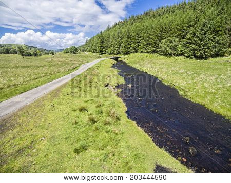 Aerial view of the street between Oban and Taynuilt next to the river Nell, Argyll, Scotland