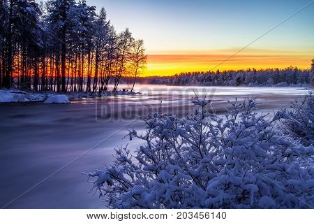 winter landscape photo of  pajakka river from Kuhmo, Finland.