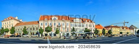Vilnius, Lithuania - August 13, 2017: Beautiful cityscape of Vilnius old town and bright blue sky,  Lithuania. Vilnius city panorama. Street panorama near Vilnius city hall.
