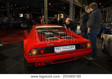 MAASTRICHT NETHERLANDS - JANUARY 09 2015: Sports car Ferrari Berlinetta Boxer BB512i 1983. Rear view. International Exhibition InterClassics & Topmobiel 2015