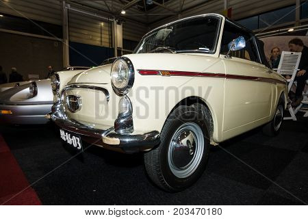 MAASTRICHT NETHERLANDS - JANUARY 09 2015: A minicar Autobianchi Bianchina Cabriolet. International Exhibition InterClassics & Topmobiel 2015