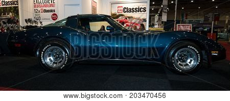 MAASTRICHT NETHERLANDS - JANUARY 09 2015: Sports car Chevrolet Corvette Stingray Coupe (C3). International Exhibition InterClassics & Topmobiel 2015