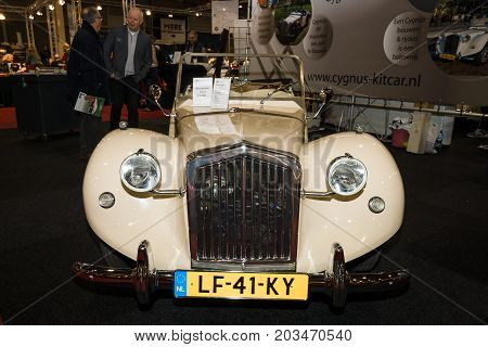 MAASTRICHT NETHERLANDS - JANUARY 09 2015: Modern car in retro style Cygnus Kitcar built on the basis of the Citroen 2CV 2001. International Exhibition InterClassics & Topmobiel 2015