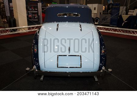 MAASTRICHT NETHERLANDS - JANUARY 09 2015: British two-door sports saloon Jaguar Mk IV 35 litre Drop Head Coupe Vanden Plas 1947. Rear view. International Exhibition InterClassics & Topmobiel 2015