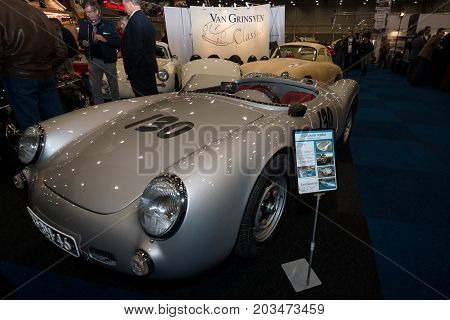 MAASTRICHT NETHERLANDS - JANUARY 09 2015: A racing sports car Porsche 550 Spyder (Replica) nickname Little Bastard. International Exhibition InterClassics & Topmobiel 2015