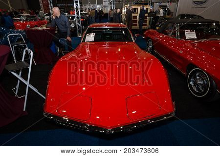 MAASTRICHT NETHERLANDS - JANUARY 09 2015: Sports car Chevrolet Corvette Stingray Coupe (C3). International Exhibition InterClassics & Topmobiel 2015
