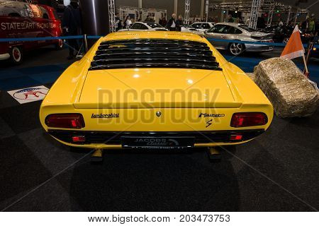 MAASTRICHT NETHERLANDS - JANUARY 09 2015: Sports car Lamborghini Miura. Rear view. International Exhibition InterClassics & Topmobiel 2015