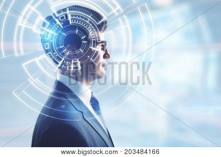 Side portrait of handsome young businessman on blurry city background with digital pattern. Innovation concept