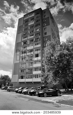 Chomutov, Czech Republic - August 12, 2017: High-rise House And Parked Cars In The Lidice Street Dur