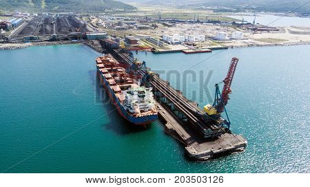 ship under load at a coal terminal Port Vostochny Russia 4.09.2017