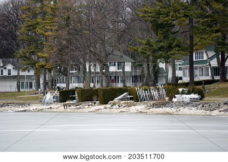 A view of beachfront homes on Beach Drive in Wequetonsing, Michigan, during March.