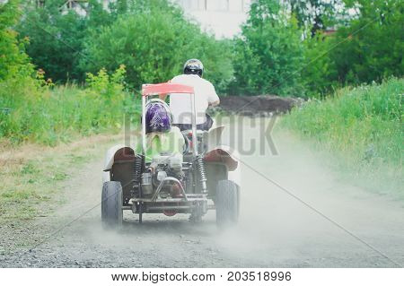Man driving off-road with quad bike or ATV.