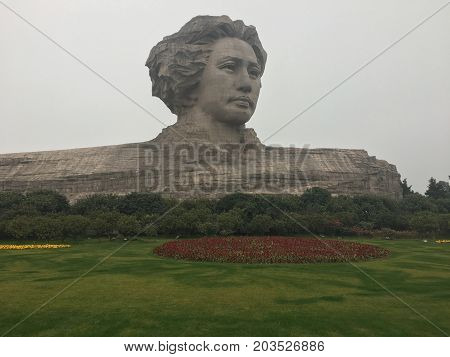 Changsha Hunan China , 1 February 2017 : Mao Zedong sculpture in orange Chau Tau island, Changsha City, Hunan Province, china