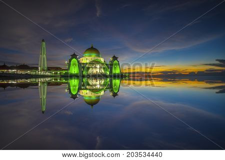 Strait mosque during beautiful blue hour .
