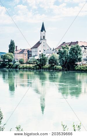 Saint Gertraud church in Passau Germany. Cultural heritage. Religious architecture. Blue photo filter. Architectural theme.