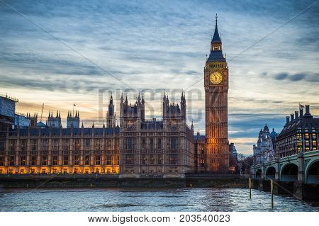 London England - The famous Big Ben Houses of Parliament and Westminster Bridge at dusk