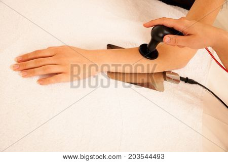 Physiotherapist Doing Tecar Therapy Alterantive Treatment On A Woman Patient