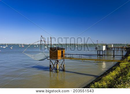 Fishing huts and carrelets over the estuary at St Nazaire, France