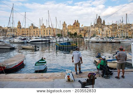 Boats And Yachts Anchoring In Valletta, Malta