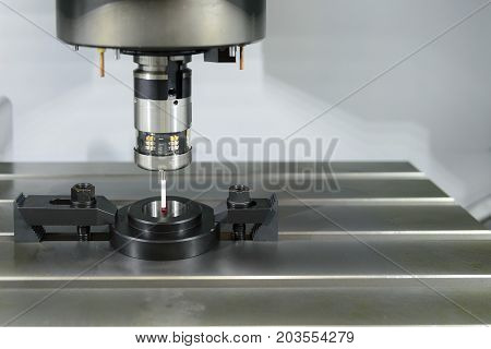 The Measurement probe attach on CNC's machine calibrate with ring gauge.Quality control precesss on CNC machine.