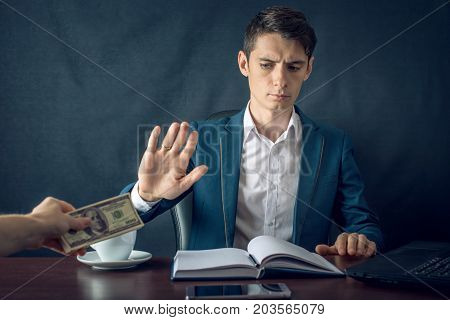 Man Businessman In Suit Refuses To Take The Money By Showing That He Is Not A Grafter. Concept Of Co