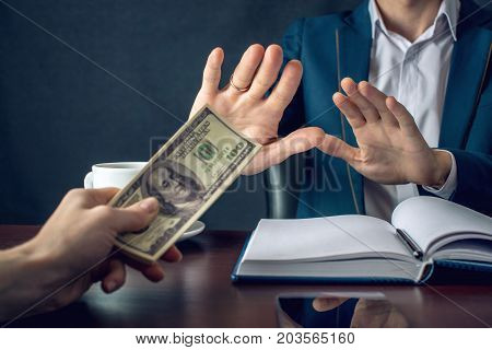 Man Businessman In Suit Refuses To Take The Money By Showing That He Is Not A Grafter. Concept Of Co